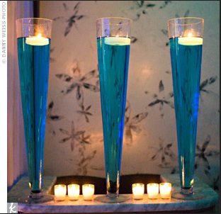 colored water floating candle centerpieces