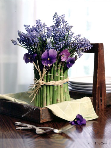 flowers wrapped in asparagus centerpiece